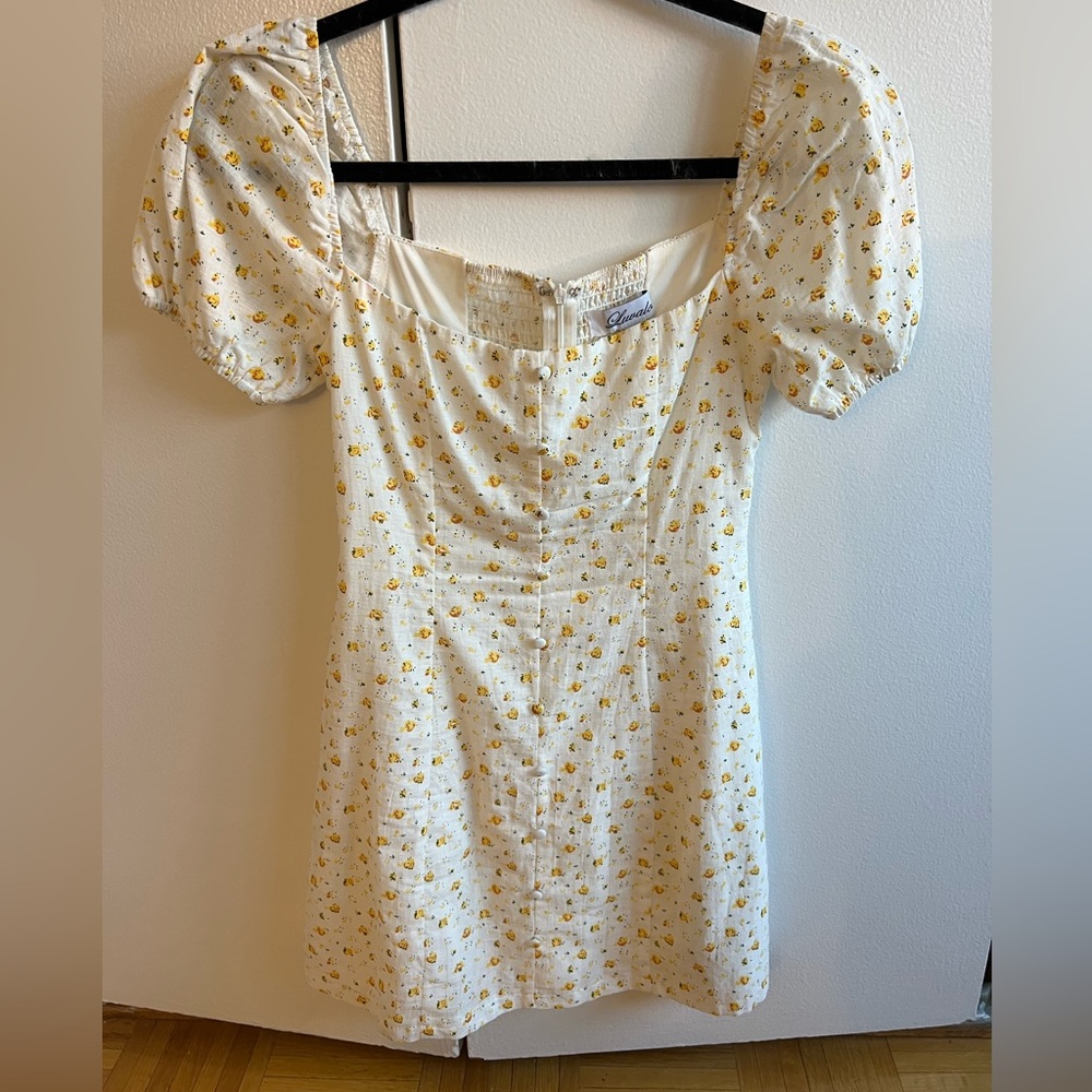 FLORAL SHORT SLEEVE MINI DRESS in a size 2